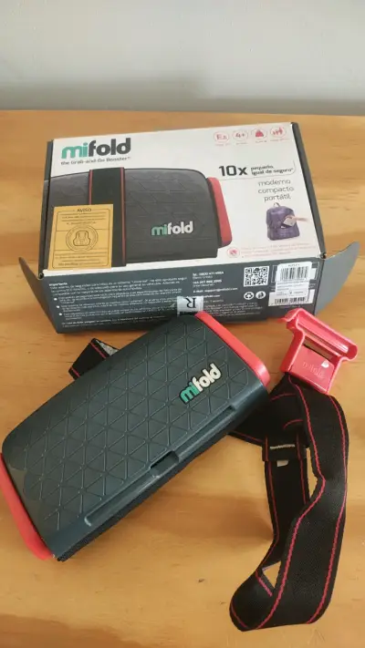 Asiento elevador portátil Mifold compacto - miniatura 1