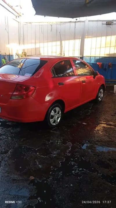 Auto Chevrolet Aveo Rojo en Buen Estado - miniatura 1