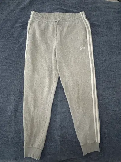 Pantalones deportivos grises Adidas con franjas - miniatura 1