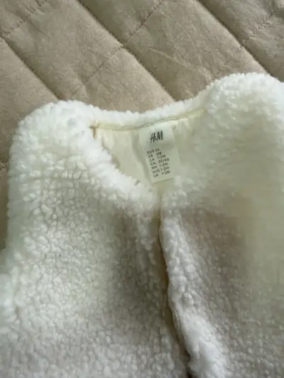 Chaleco de bebé blanco H&M suave - miniatura 1