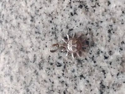 Colgante de plata en forma de sol - miniatura 1