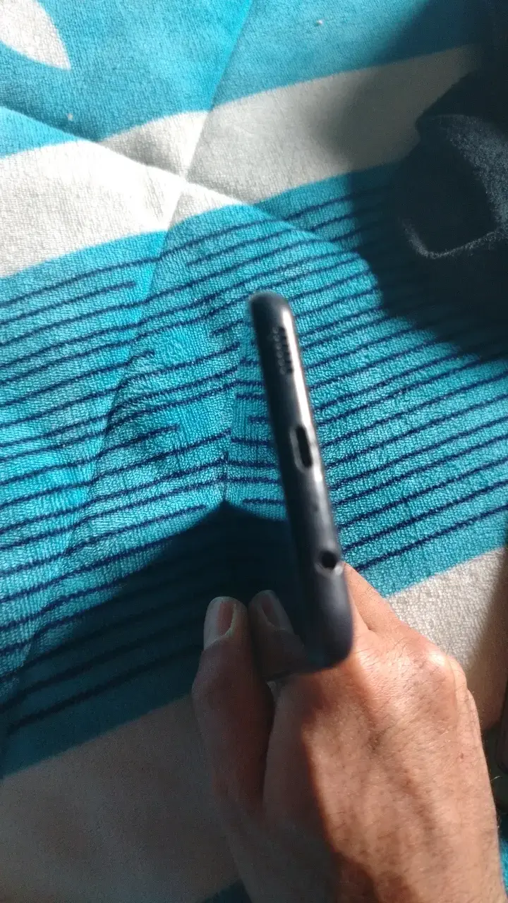 Smartphone con triple cámara trasera - 5