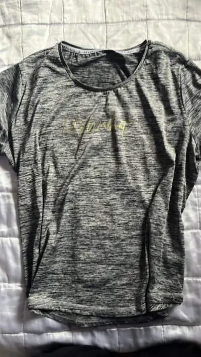 Polera deportiva gris para mujer - miniatura 1
