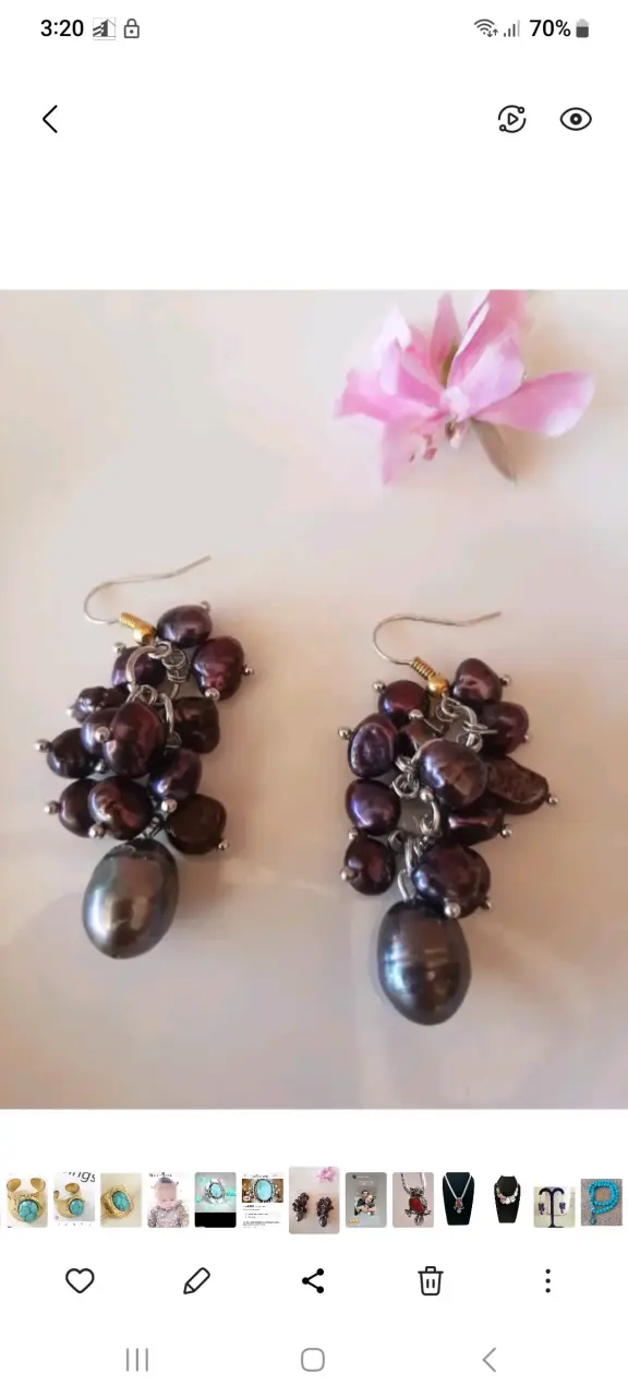 Aros colgantes con perlas moradas