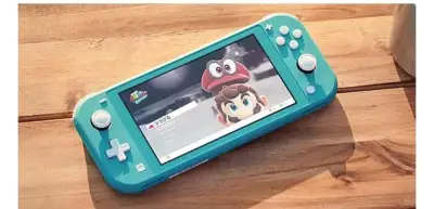 Nintendo Switch Lite Turquesa en buen estado - miniatura 2
