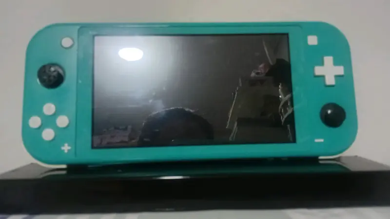 Nintendo Switch Lite Turquesa en buen estado - 5