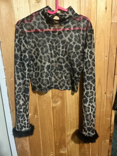 Blusa de malla con animal print - miniatura 1