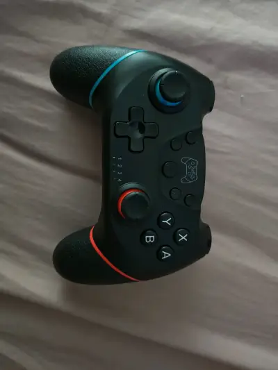 Control inalámbrico para Nintendo Switch con luces LED - miniatura 2