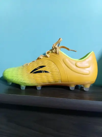 Zapatillas de fútbol amarillas para césped - miniatura 1