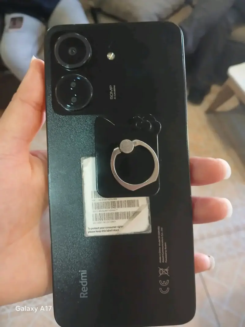 Smartphone Redmi con cámara dual y soporte - 2