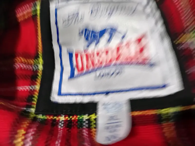 Chaqueta negra Lonsdale con forro escocés - 4