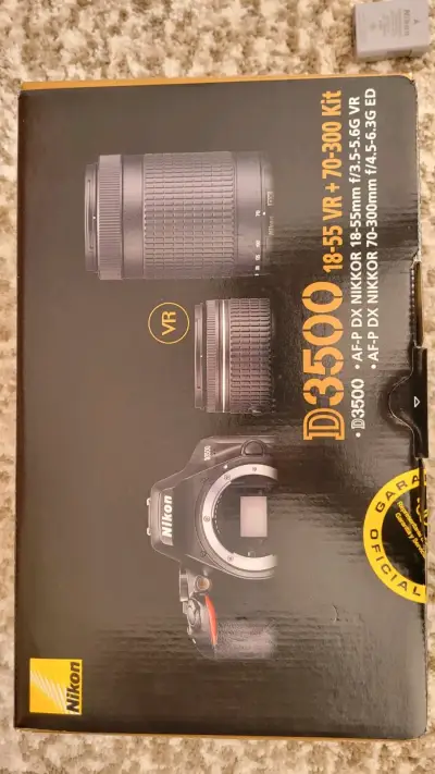 Cámara Nikon D3500 con lentes y mochila - miniatura 6
