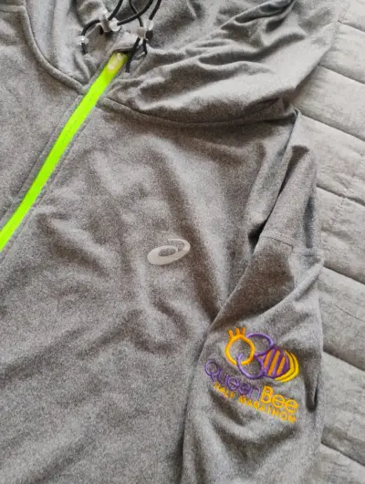 Polerón deportivo gris Asics con capucha - miniatura 1