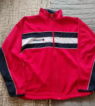 Chaqueta deportiva Uhlsport roja y azul - miniatura 1