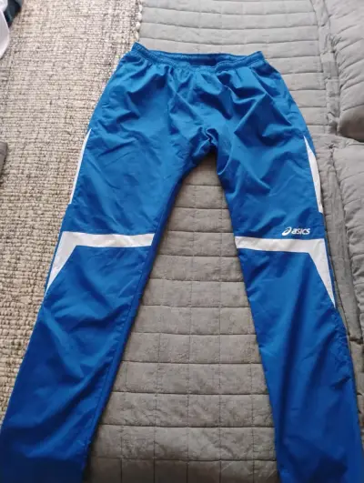 Pantalones deportivos Asics azul para hombre - miniatura 3