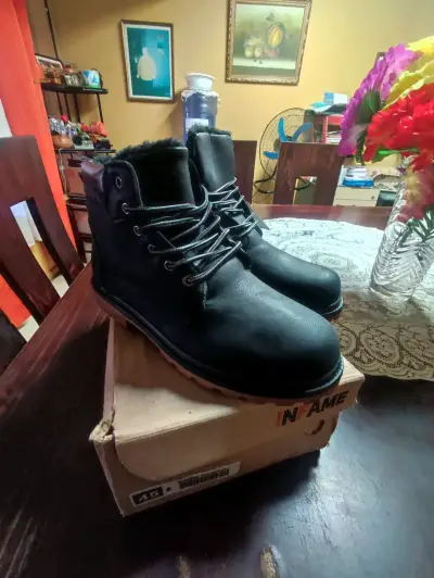 Botas de cuero negro con forro interior cálido - miniatura 1