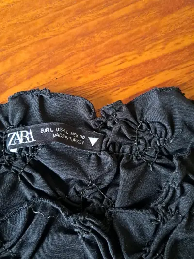 Blusa negra sin mangas Zara talla L - miniatura 1