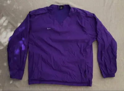 Cortavientos Nike morado para hombre - miniatura 1