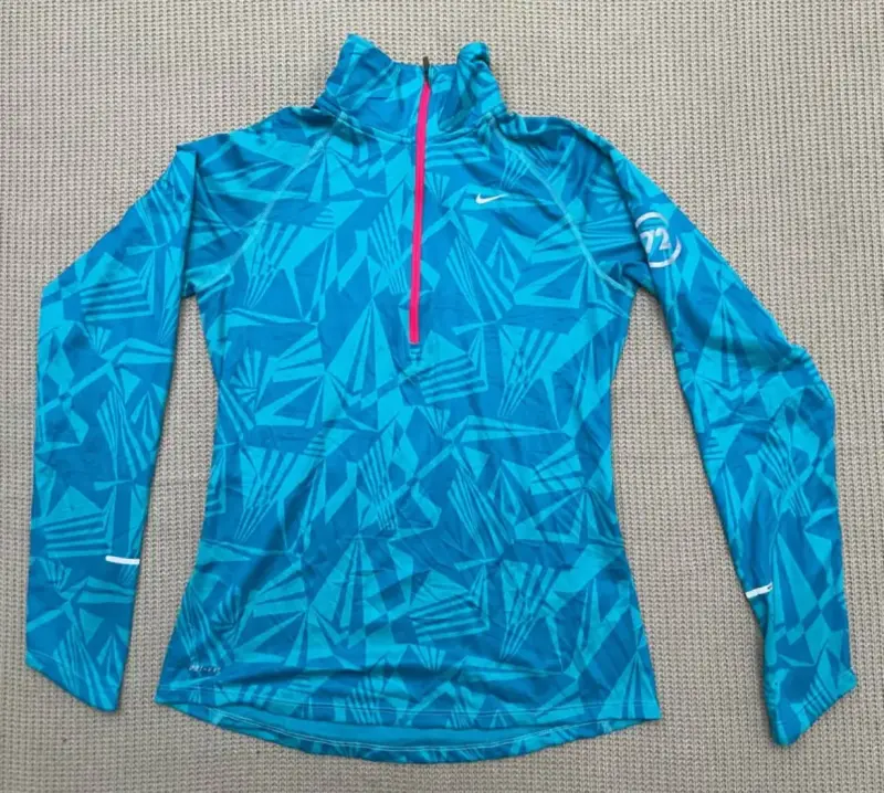 Polera deportiva Nike Element azul para mujer - 1