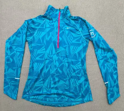 Polera deportiva Nike Element azul para mujer - miniatura 1