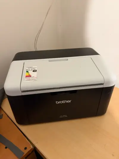 Impresora láser Brother HL-1202 compacta - miniatura 1