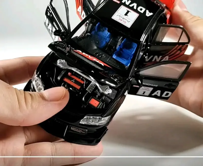 Auto Mitsubishi Lancer Evo IX9 luces y Sonido 1:32 - 4