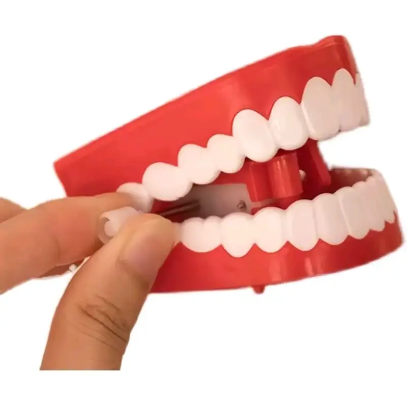 Juguete de dientes saltarines con ojos. Dentadura - 6