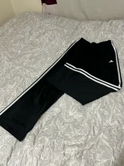 Pantalones deportivos negros Adidas con franjas - miniatura 1