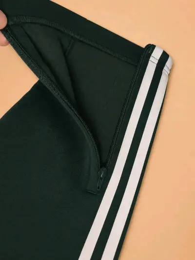 Pantalones deportivos verdes Adidas con franjas - miniatura 2