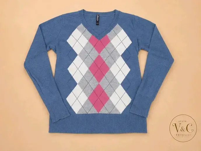 Suéter de punto azul con diseño de rombos de mujer