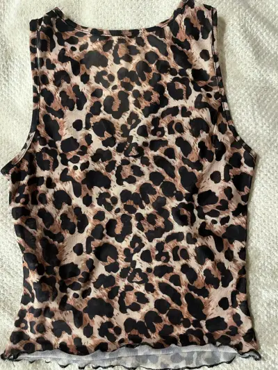Blusa de encaje con estampado animal print - miniatura 2