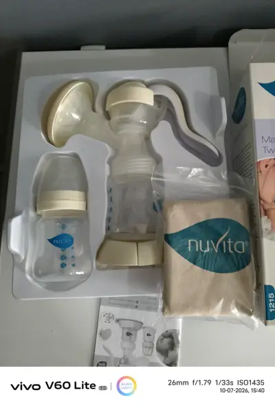 Extractor de Leche Manual Nuvita Materno Twist - miniatura 1