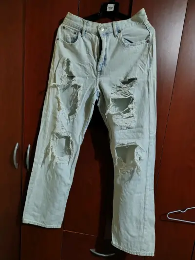 Jeans rasgados de mezclilla talla 38 - miniatura 1