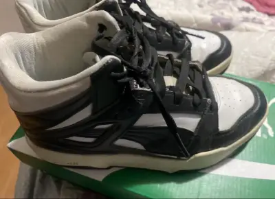 Zapatillas deportivas Puma negras y blancas - miniatura 1