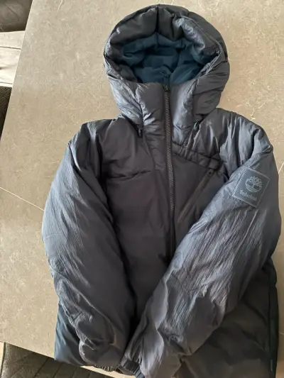 Chaqueta de invierno Timberland azul con capucha - miniatura 1