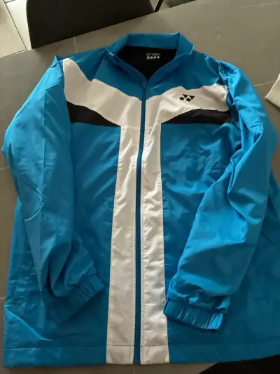 Chaqueta deportiva Yonex azul y blanca. - miniatura 1