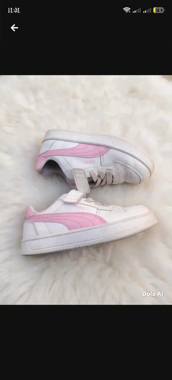 Zapatillas deportivas blancas y rosadas Puma
