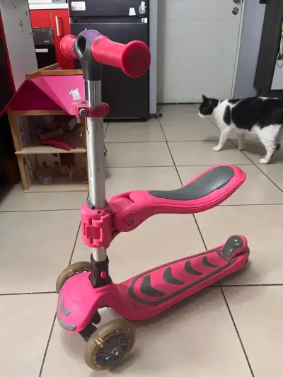 Scooter infantil rosa con asiento plegable - miniatura 1
