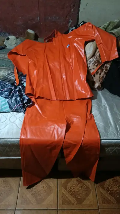 Traje impermeable naranja para lluvia - miniatura 1