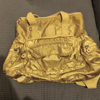 Bolso Kipling dorado con múltiples bolsillos - miniatura 1