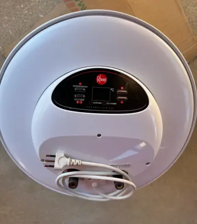 Termo eléctrico Rheem 100L - miniatura 1