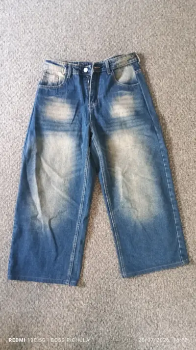 Jeans de mezclilla azul desgastados - miniatura 1