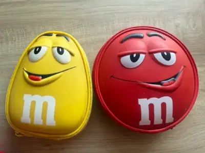 Parlantes portátiles M&M's amarillo y rojo - miniatura 1
