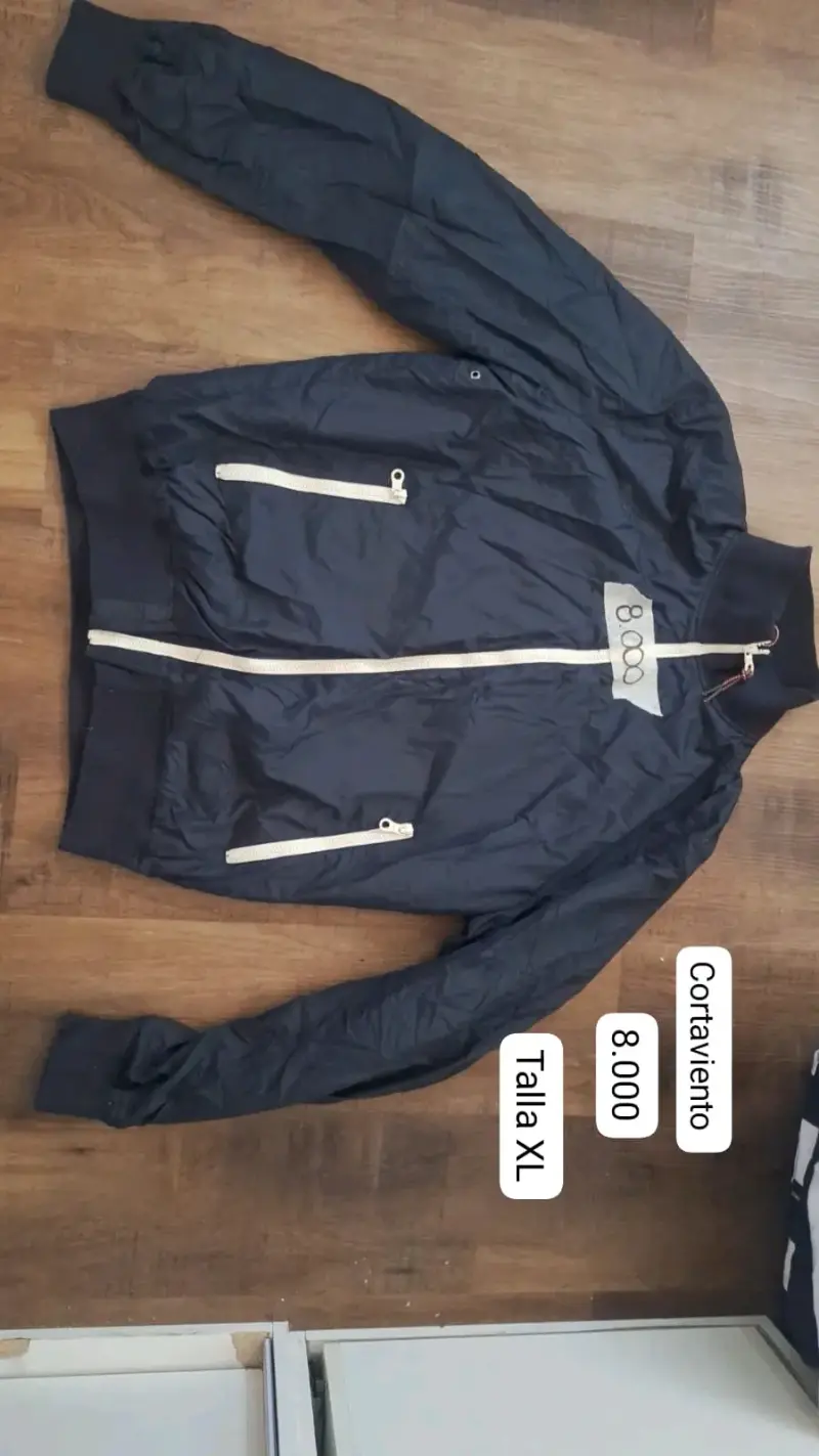 Cortaviento azul talla XL con cierre blanco