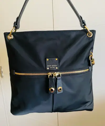 Bolso de mano negro Henri Bendel con detalles dorados - miniatura 1