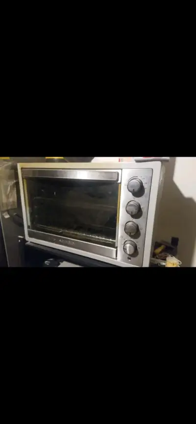 Horno eléctrico compacto con controles manuales - miniatura 1