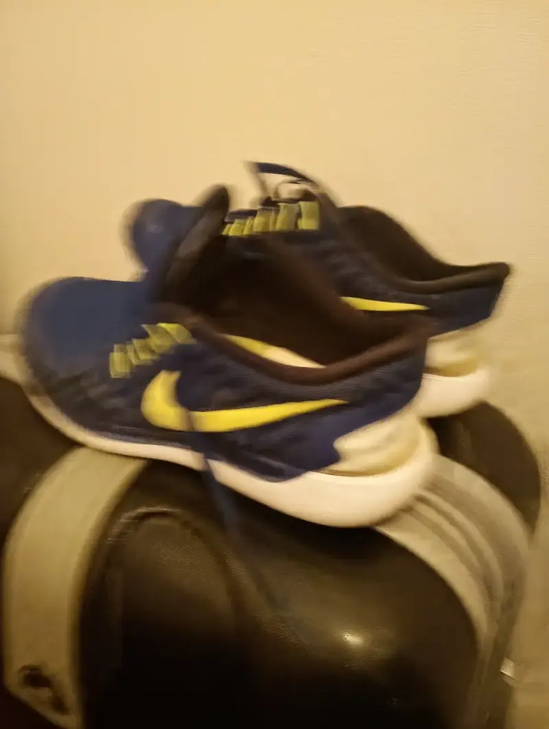 Zapatillas deportivas Nike azul y amarillo - 4