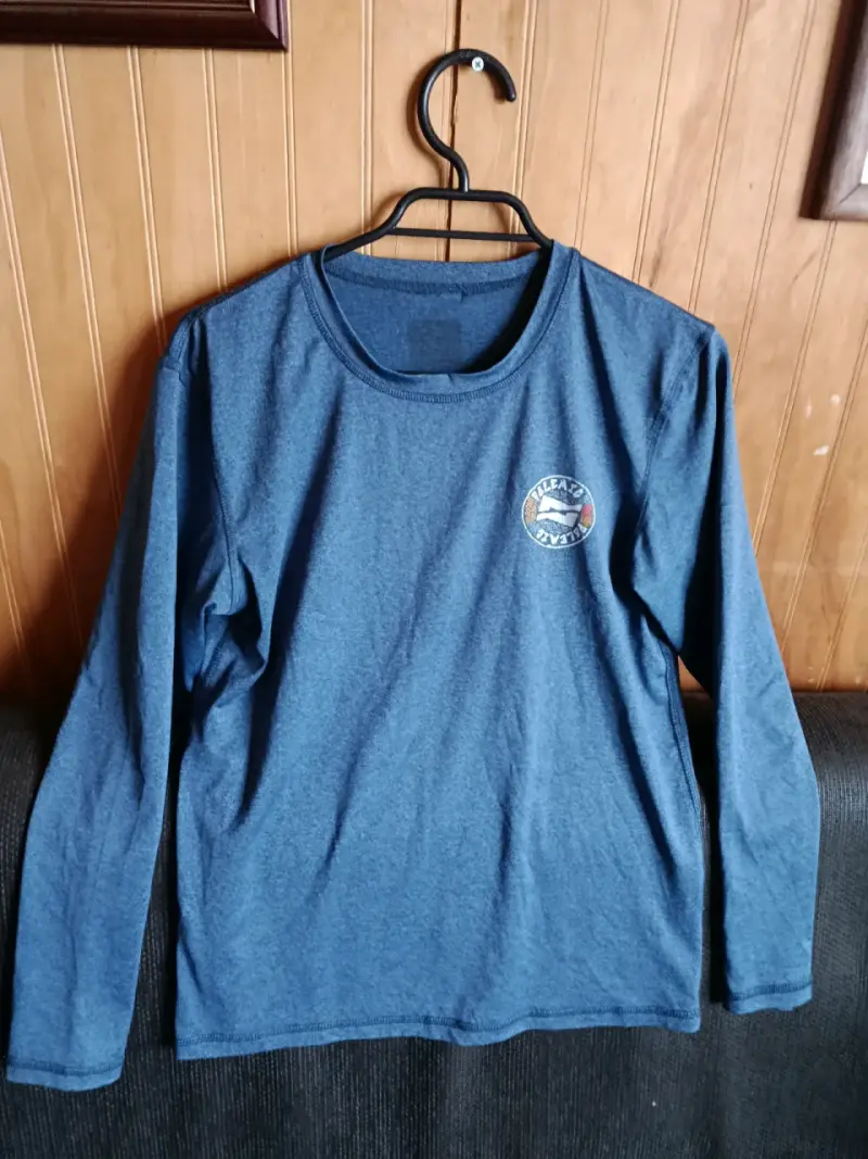 Polera manga larga gris Under Armour Defenders - 6