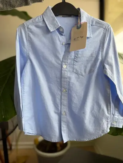 Camisa celeste para niño de manga larga - miniatura 1
