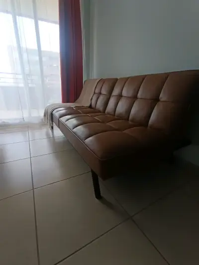 Sofá cama de cuero marrón moderno - miniatura 1